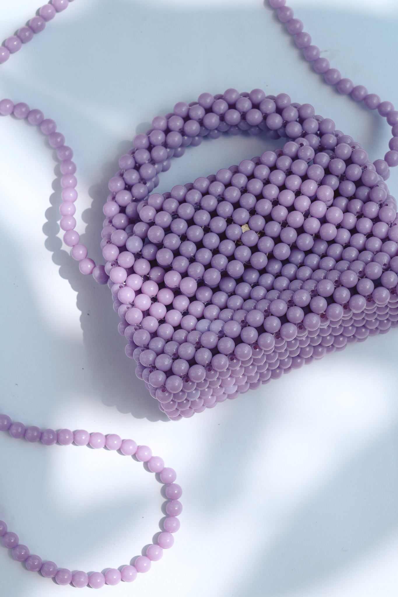 THE KIWI BEADED HANDBAG Color: Translucent Brown by HIBISCUS THE LABEL Designer Homewares Furniture Australia