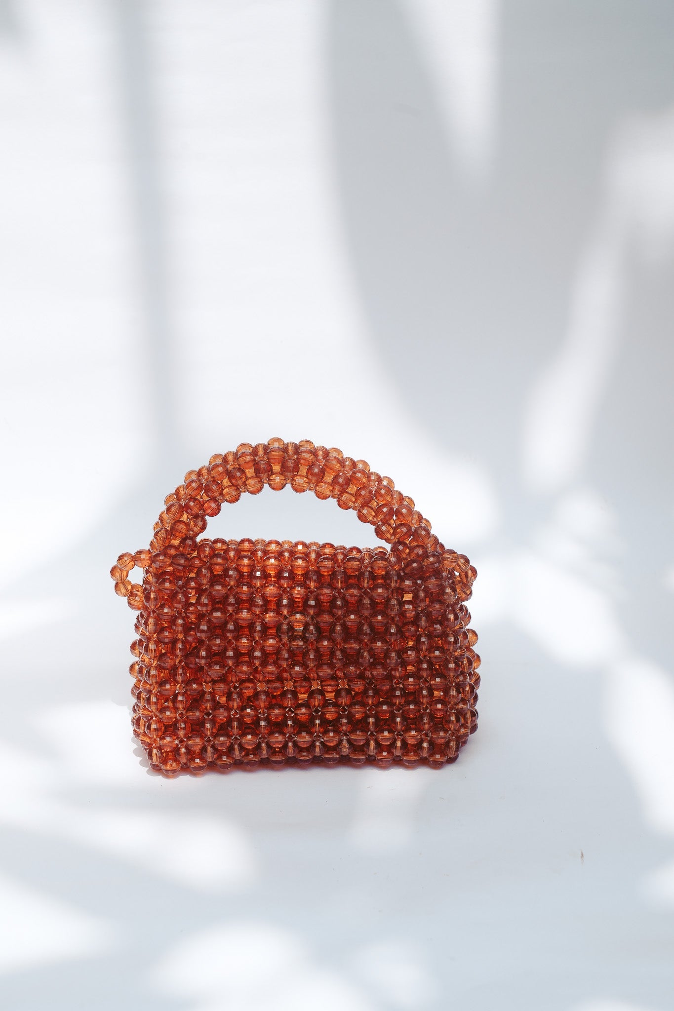 THE KIWI BEADED HANDBAG Color: Translucent Brown by HIBISCUS THE LABEL Designer Homewares Furniture Australia