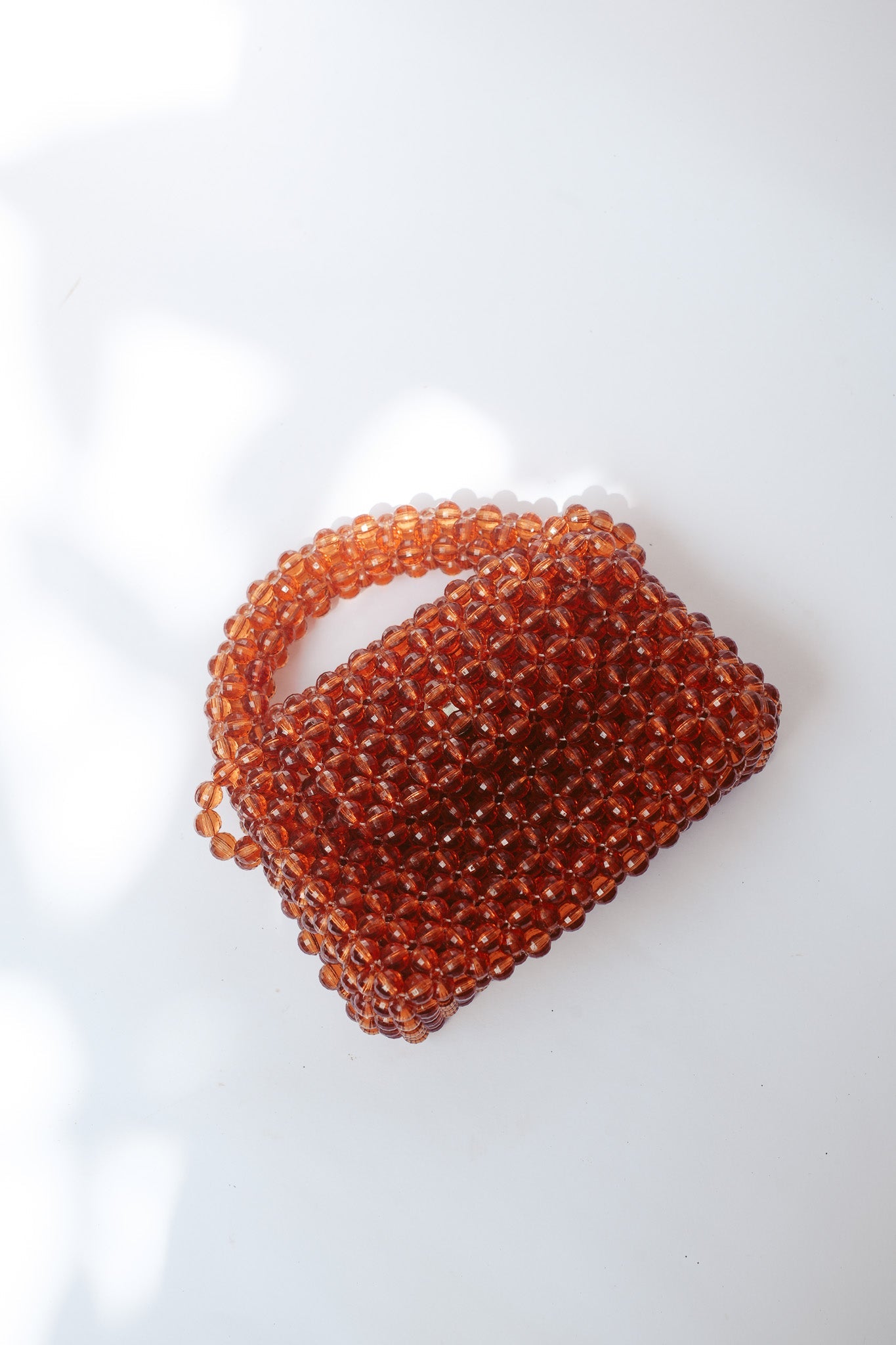 THE KIWI BEADED HANDBAG Color: Translucent Brown by HIBISCUS THE LABEL Designer Homewares Furniture Australia