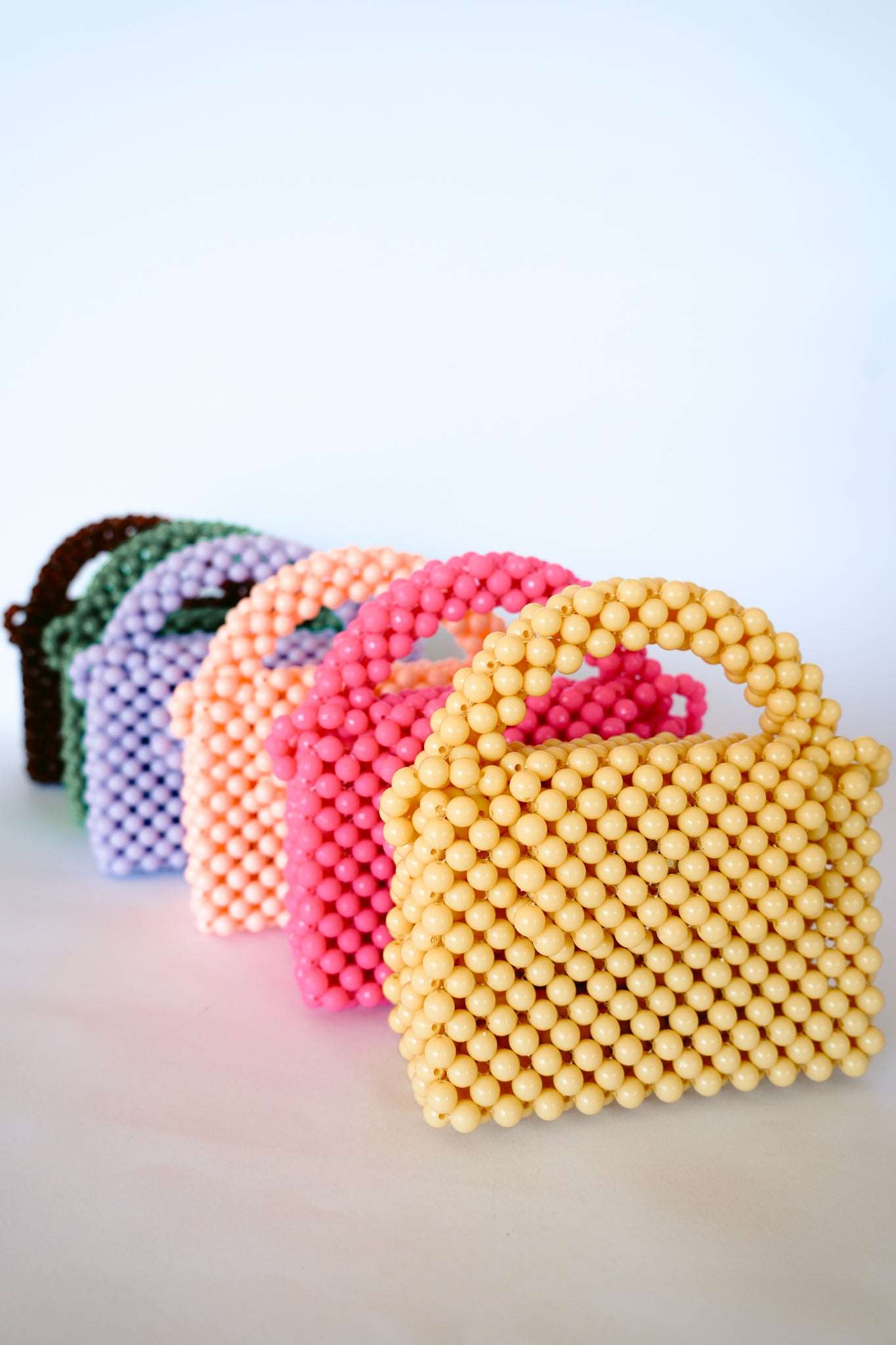 THE KIWI BEADED HANDBAG Color: Translucent Brown by HIBISCUS THE LABEL Designer Homewares Furniture Australia