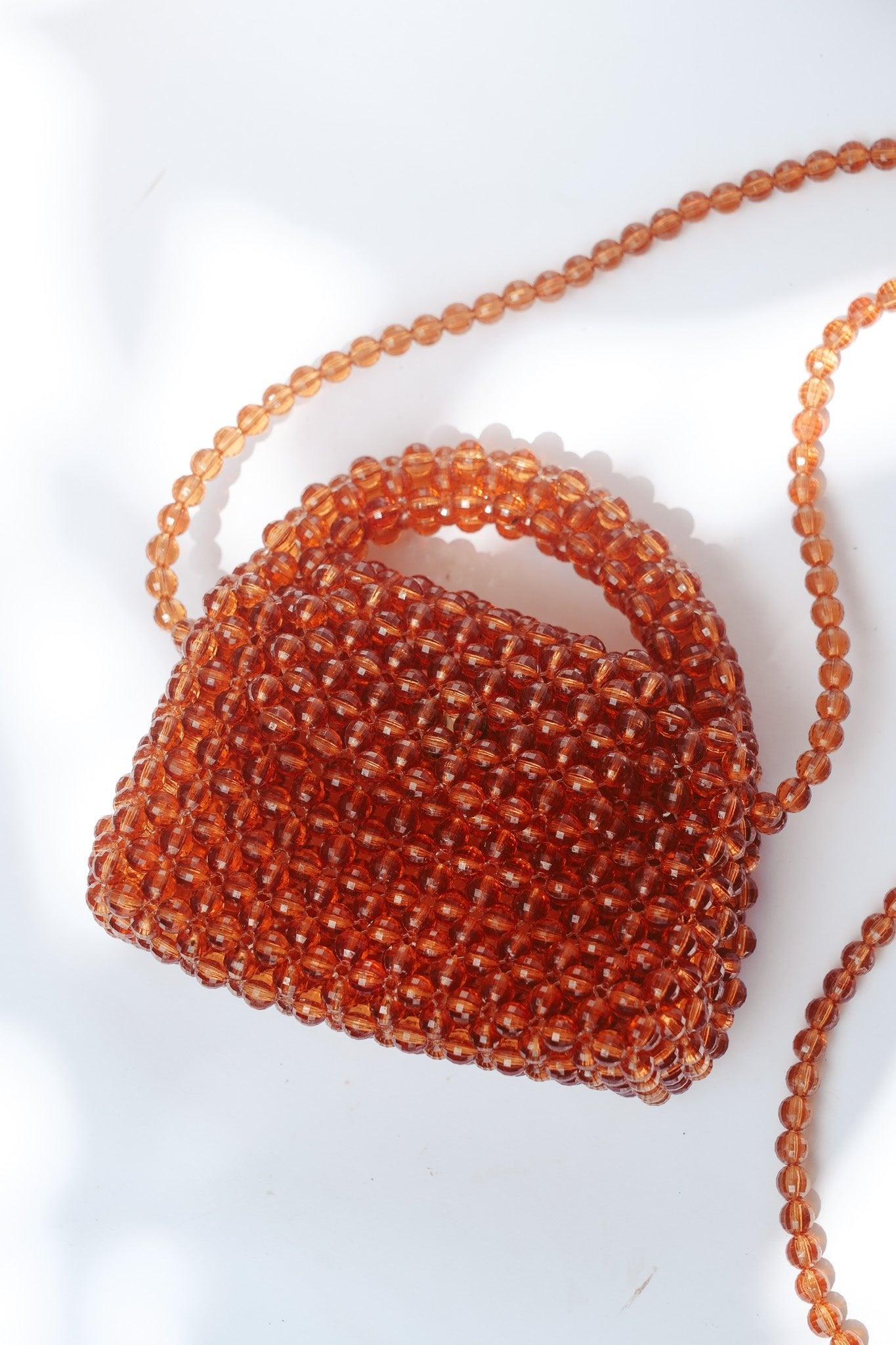 THE KIWI BEADED HANDBAG Color: Translucent Brown by HIBISCUS THE LABEL Designer Homewares Furniture Australia