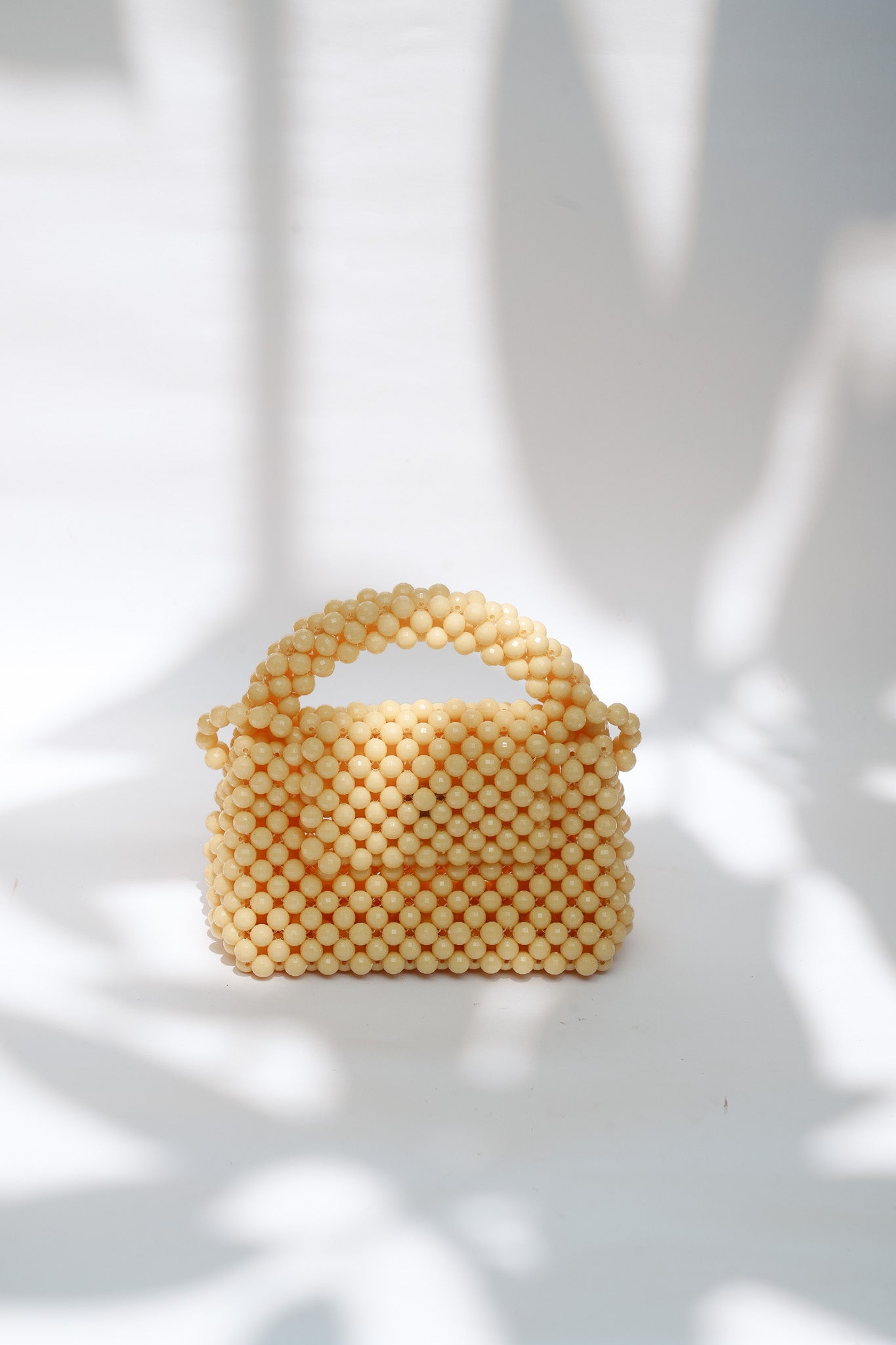 THE KIWI BEADED HANDBAG Color: Translucent Brown by HIBISCUS THE LABEL Designer Homewares Furniture Australia