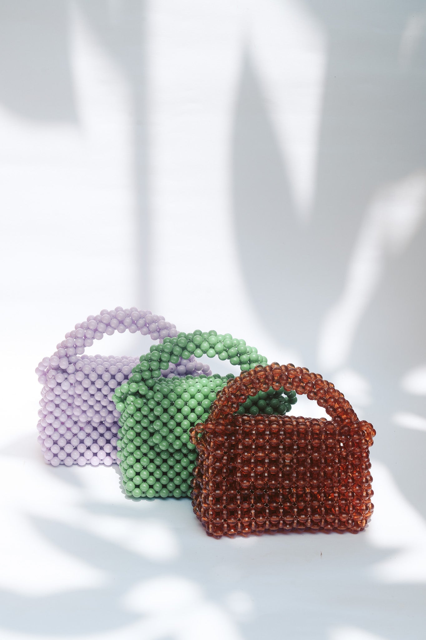 THE KIWI BEADED HANDBAG Color: Translucent Brown by HIBISCUS THE LABEL Designer Homewares Furniture Australia