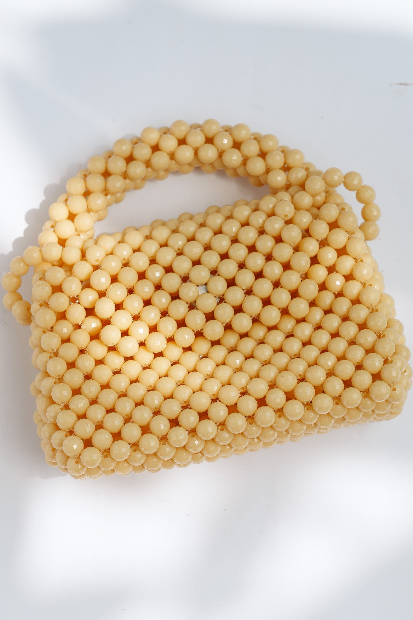 THE KIWI BEADED HANDBAG Color: Translucent Brown by HIBISCUS THE LABEL Designer Homewares Furniture Australia