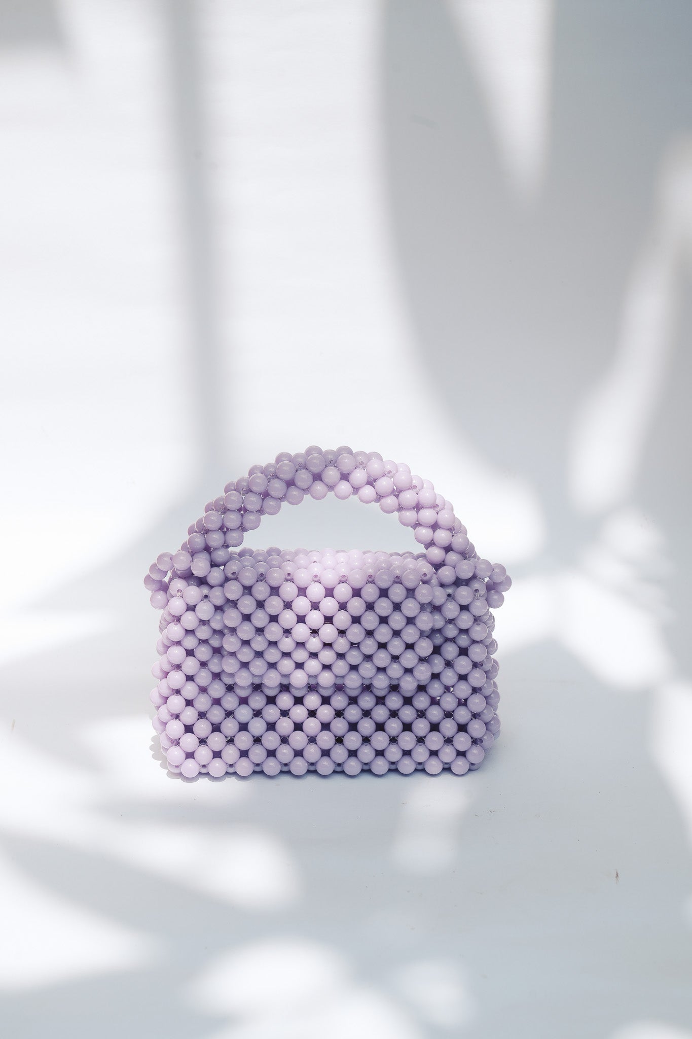 THE KIWI BEADED HANDBAG Color: Translucent Brown by HIBISCUS THE LABEL Designer Homewares Furniture Australia