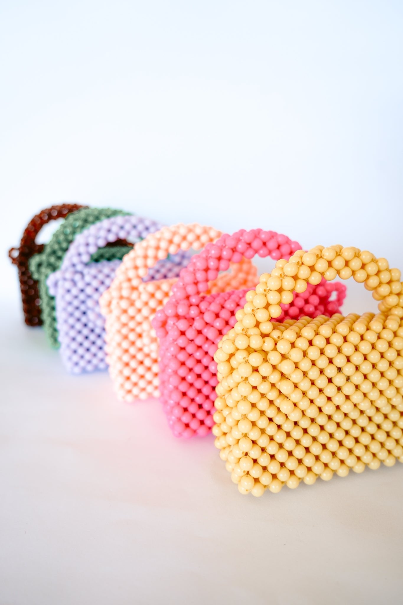 THE KIWI BEADED HANDBAG Color: Translucent Brown by HIBISCUS THE LABEL Designer Homewares Furniture Australia