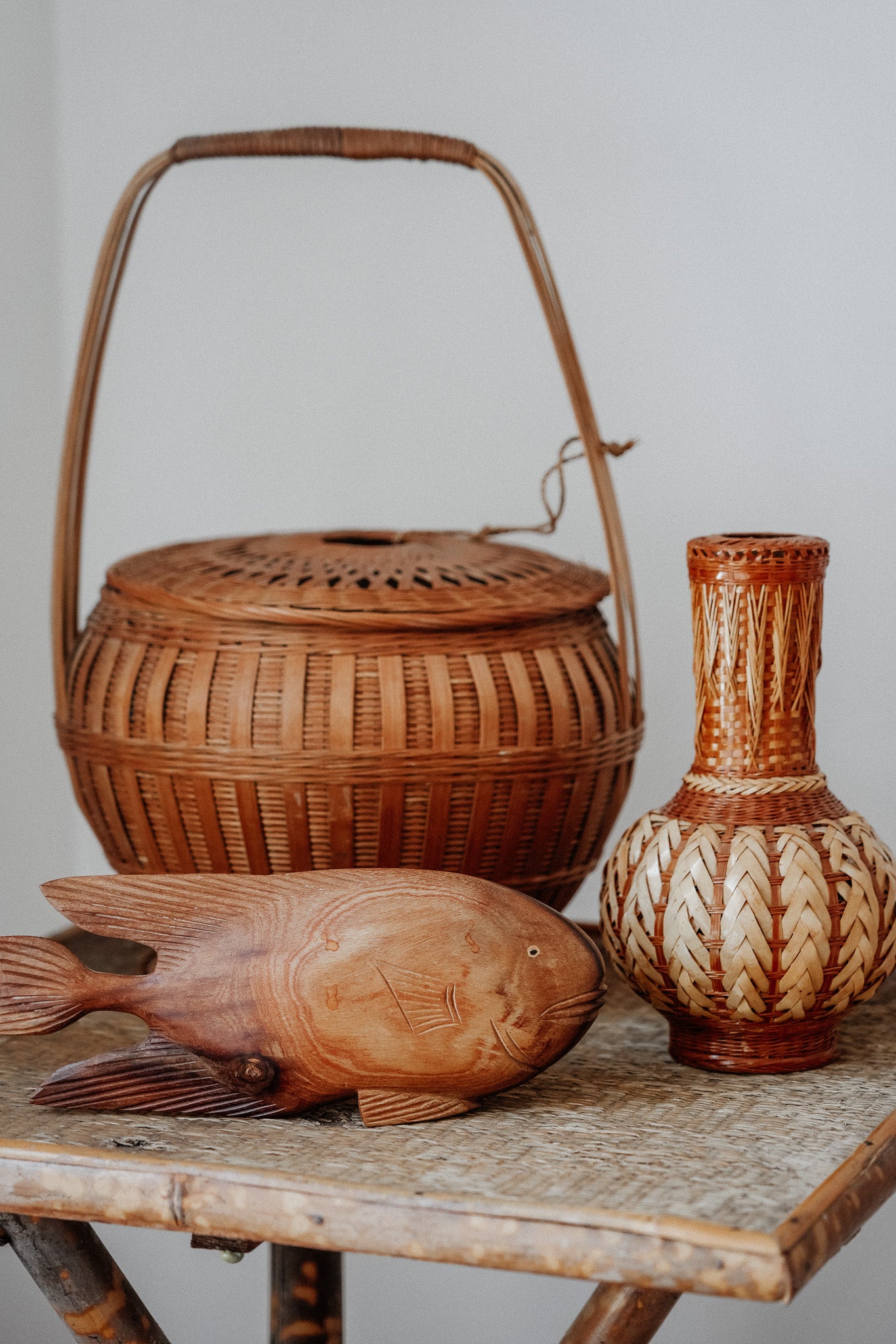 Woven basket with tie on lid