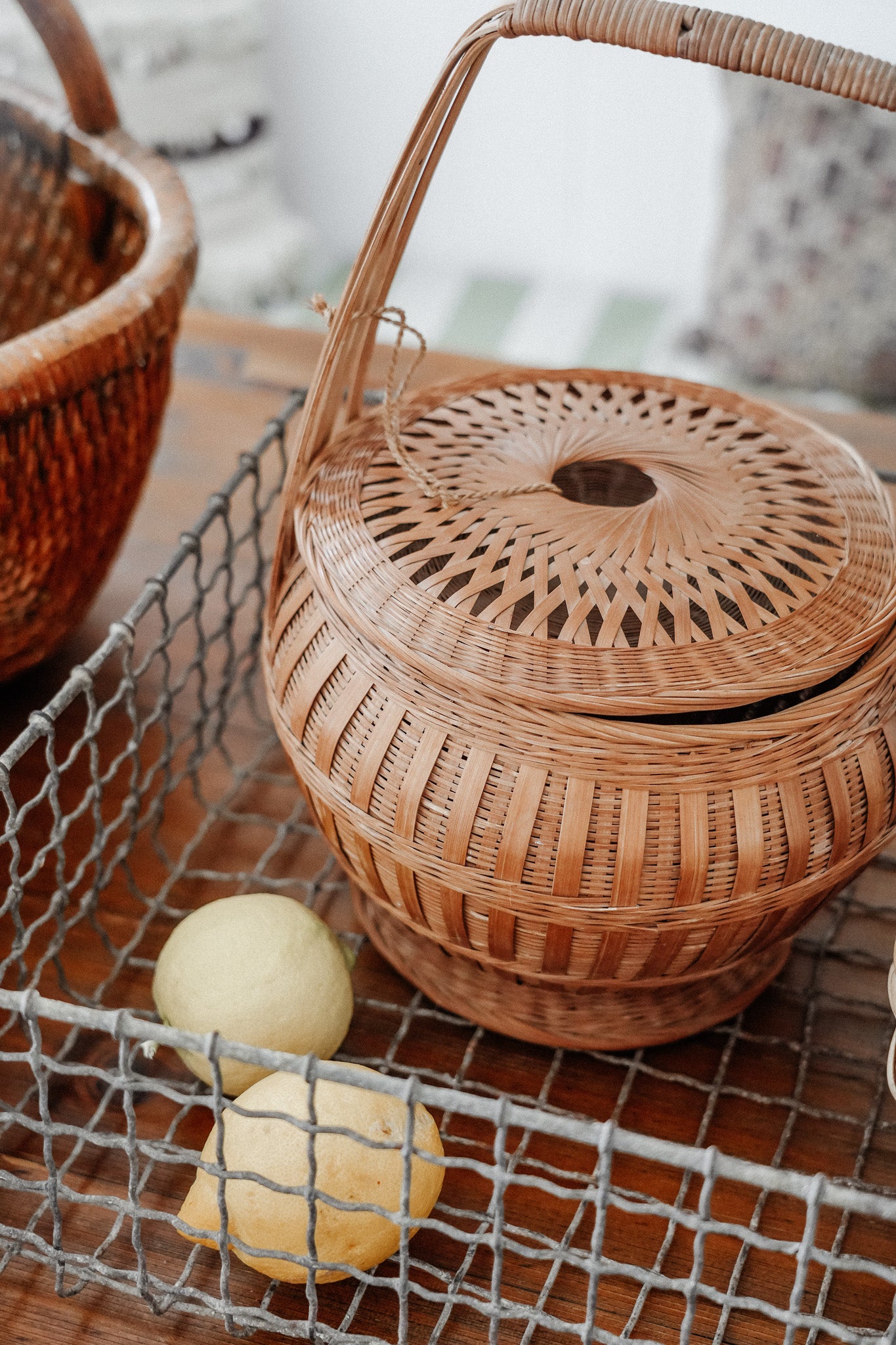 Woven basket with tie on lid