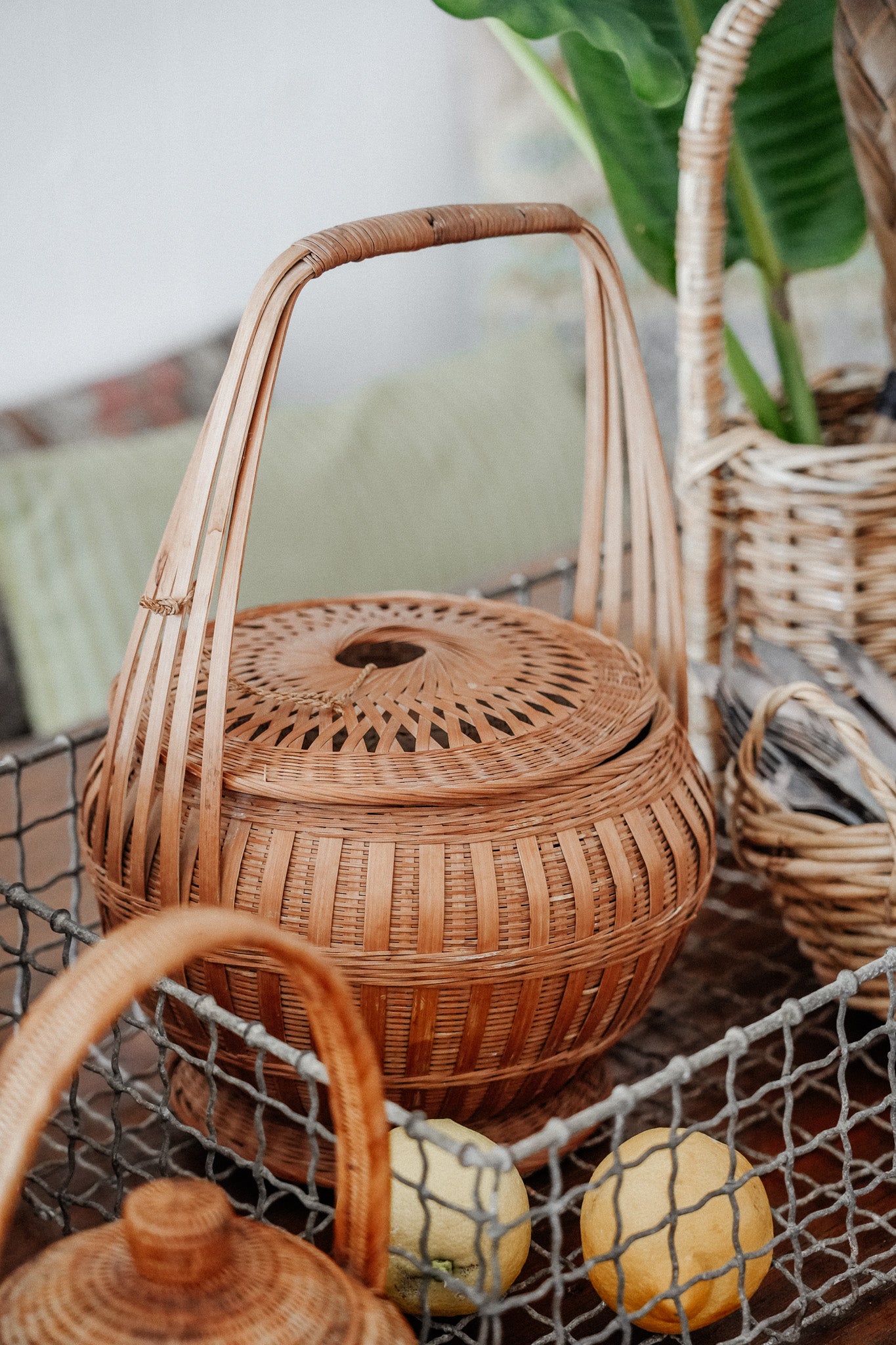 Woven basket with tie on lid