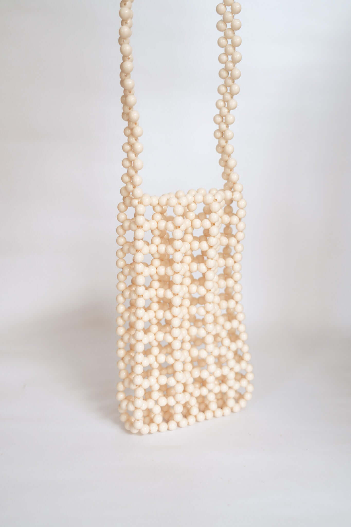 BEADED PHONE BAG - CREAM by HIBISCUS THE LABEL Designer Homewares Furniture Australia